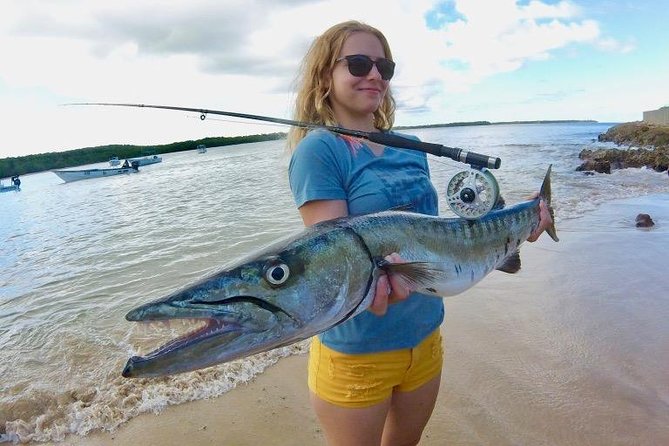 Fly Fishing Tour - Drinks, fruit, and a boat built for fishing